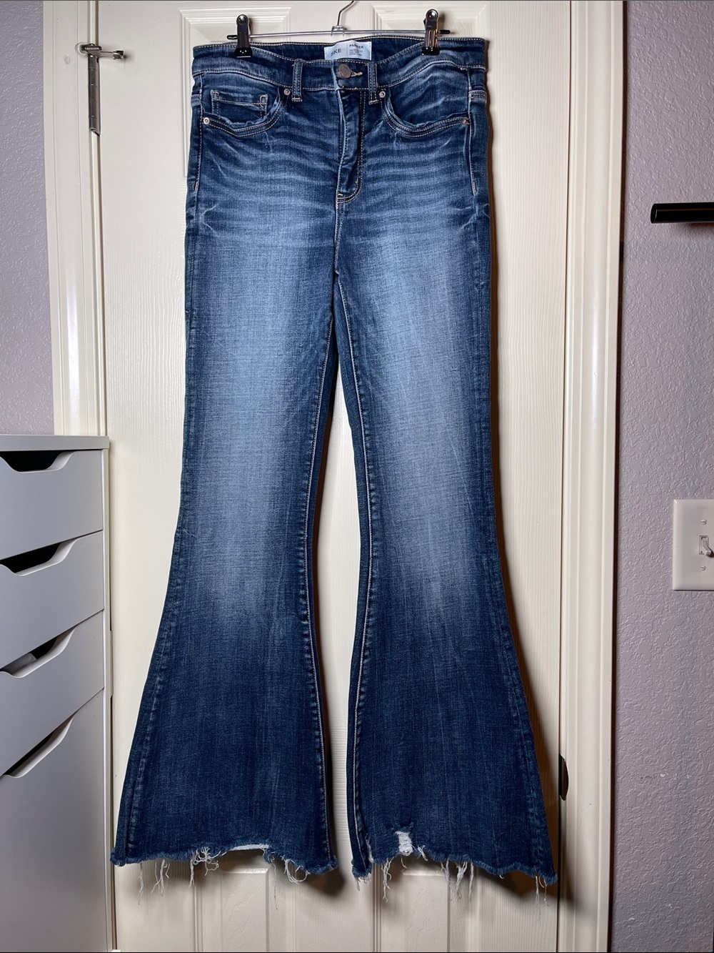 BKE Women's Blue Flare Jeans with Distressed Raw Hem